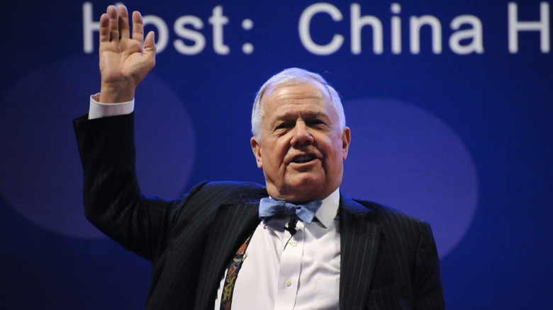 American investor Jim Rogers greeting a crowd at an event.