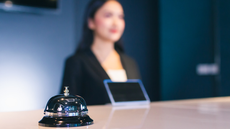 Concierge at hotel desk