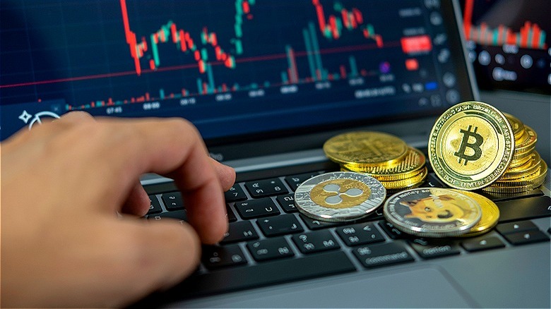 Crypto coins on laptop computer