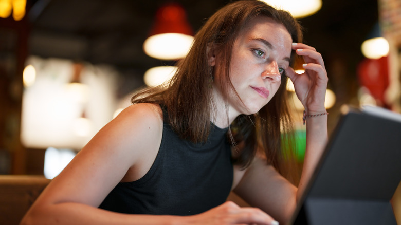 Woman working on tablet