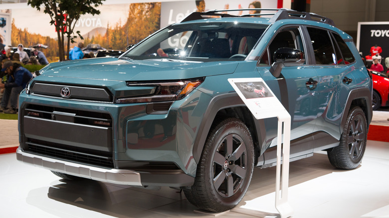 The Toyota RAV4 2026 model SUV showcased at an auto show.