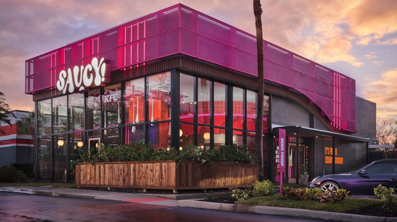 KFC's Saucy! Restaurant in Orlando, Florida at twilight.