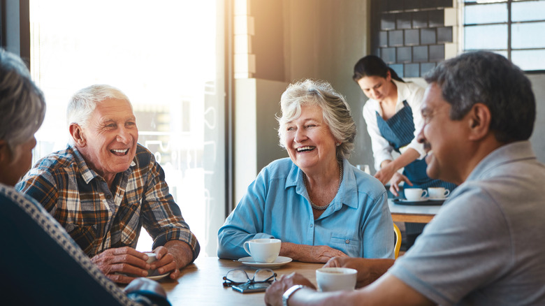 Senior friends enjoying coffee together.