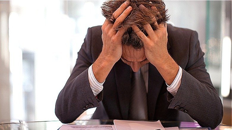 person stressed at work