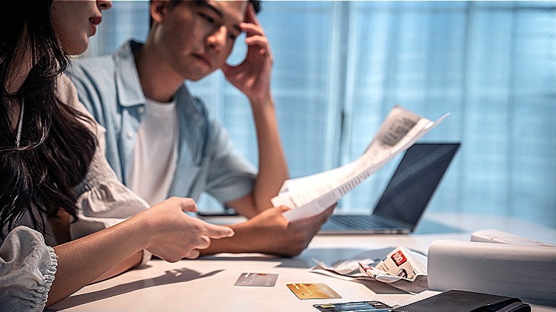couple reviewing credit card bills