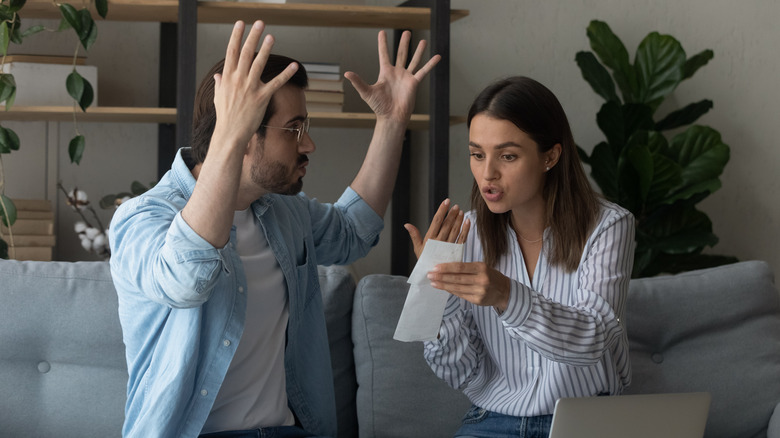 Couple arguing over money