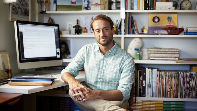 Person smiling from home office