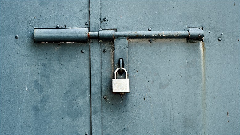 Padlock on steel door