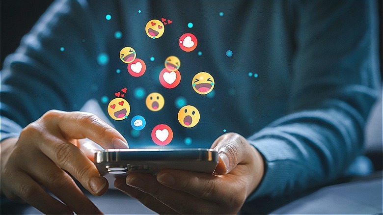 Emojis flying up from phone