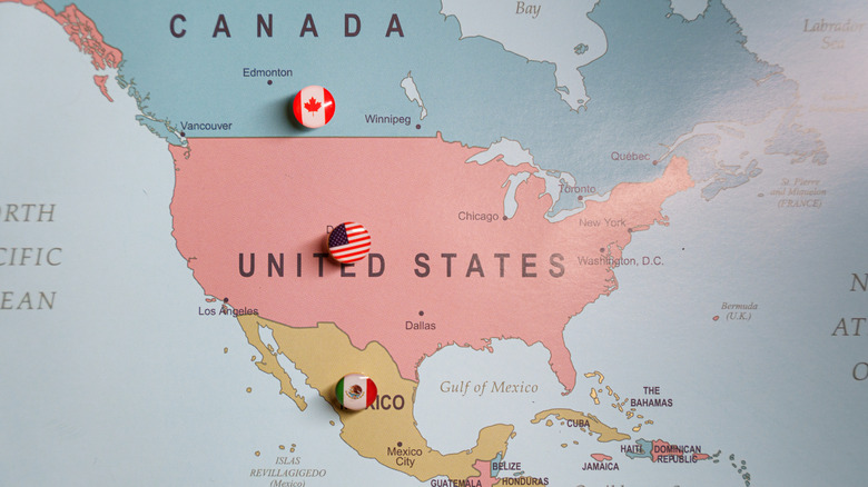 map of Canada, US, and Mexico with country pins on each