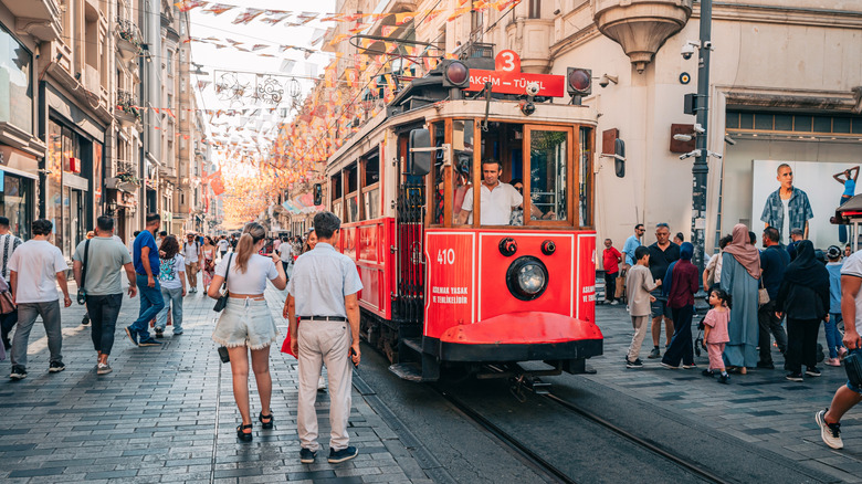 A street car with crowds on an avenue in Istanbul, Turkey