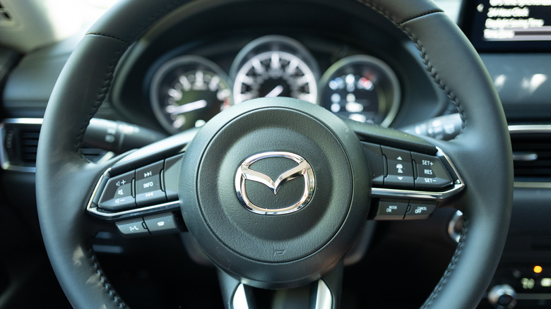 Mazda logo on a steering wheel