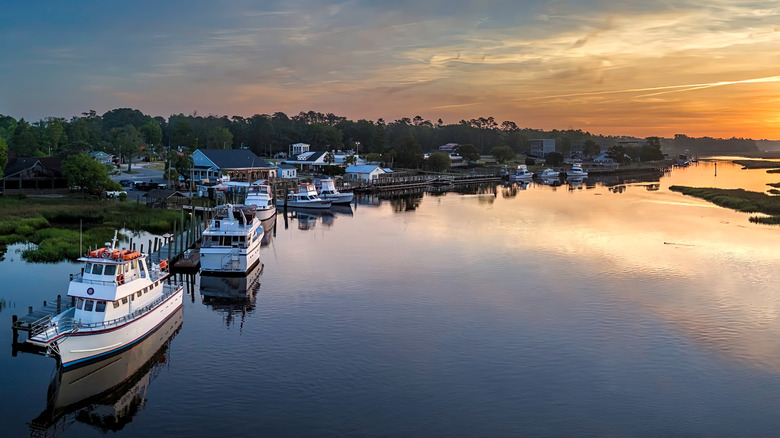 Sunrise over Calabash docks and boats