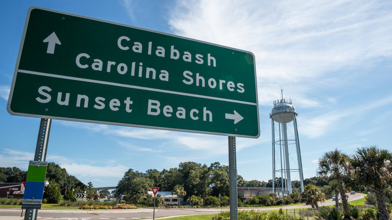 Road sign showing the way to Sunset Beach, Calabash, and Carolina Shores
