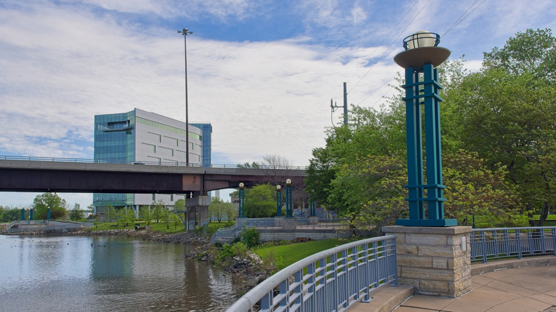 Mississippi river walkway in Moline Illinois with modern building in background.