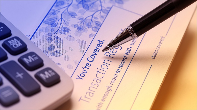 Checking account transaction register book