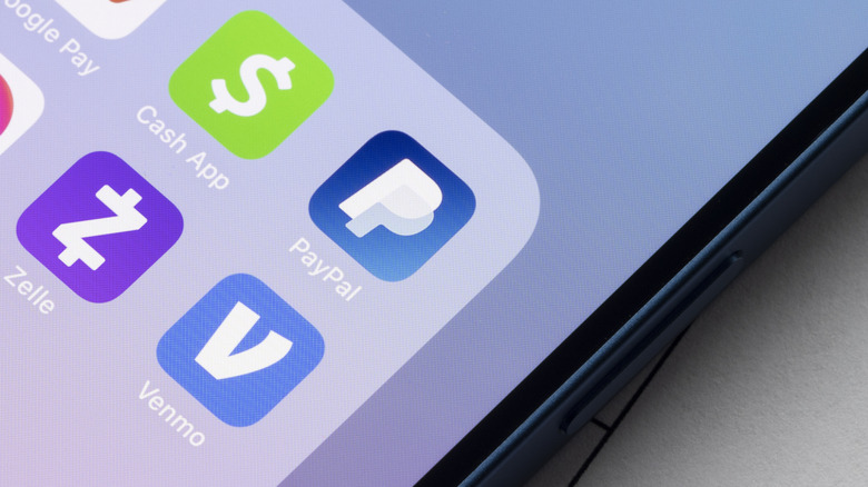 Payment apps like PayPal and Venmo are seen on an iPhone.