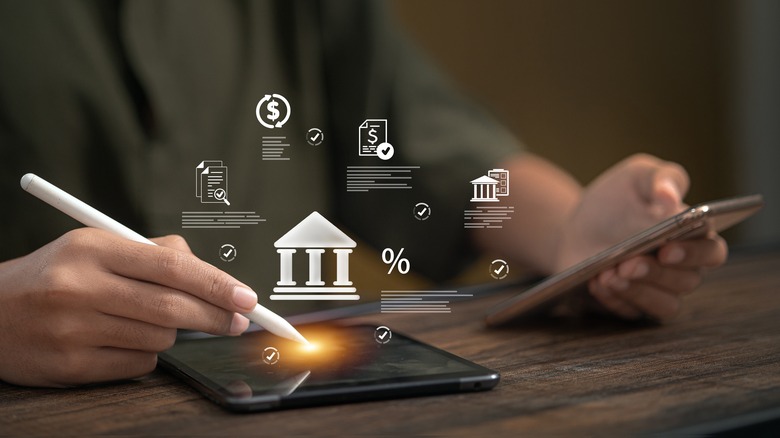 Hand over tablet managing banking options