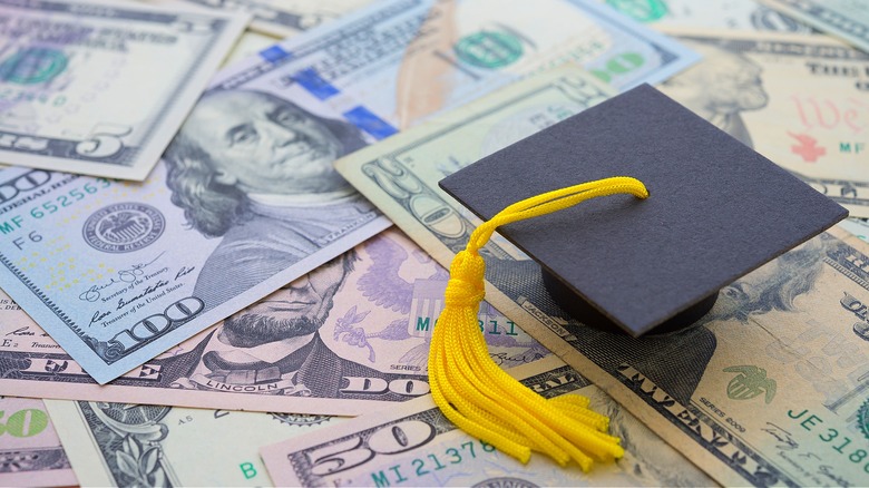 Graduation hat on U.S. currency