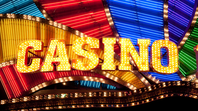 A glowing neon casino sign