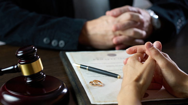 Two people sitting opposite each other in law setting