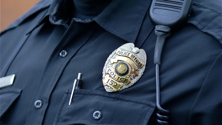 Police officer's badge on uniform