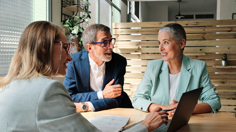 a financial advisor and clients