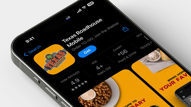The Texas Roadhouse mobile app displayed on an iPhone, set against a white background.