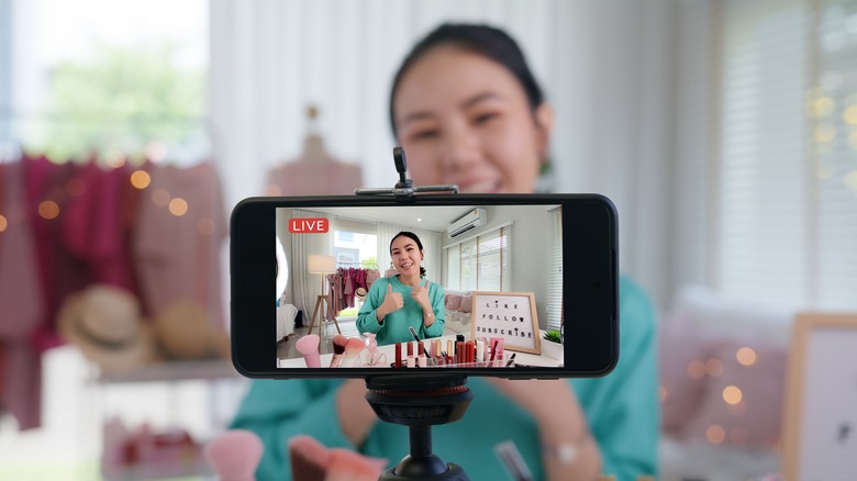woman making video content