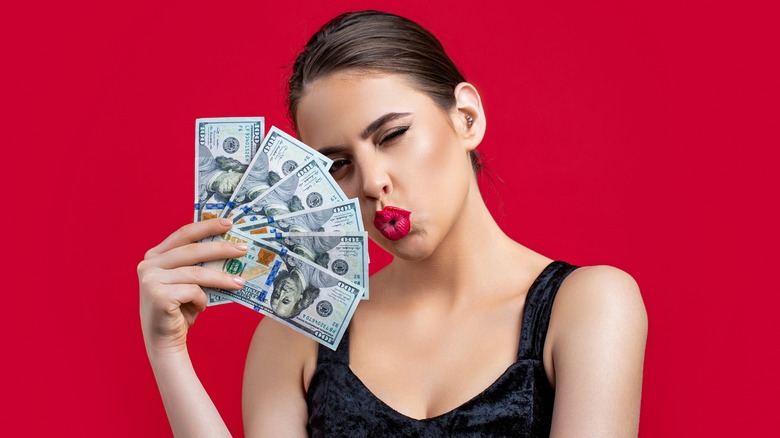 woman with lots of cash