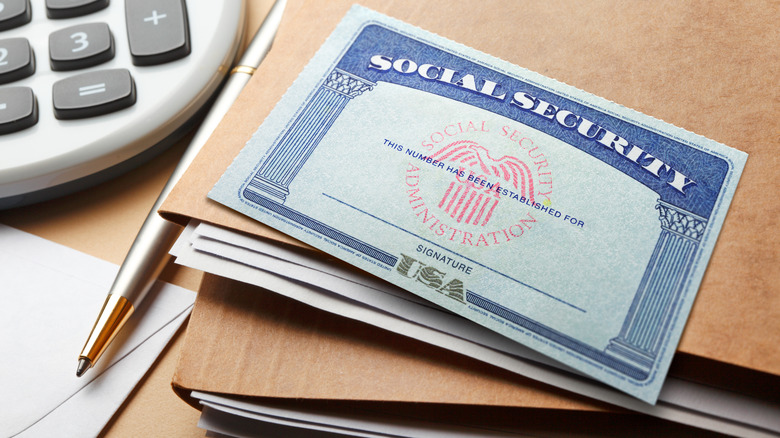 Social Security card on folders