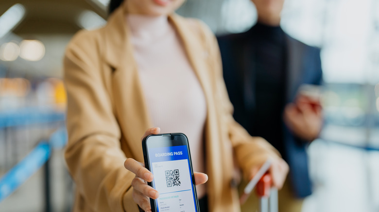 woman with digital boarding pass