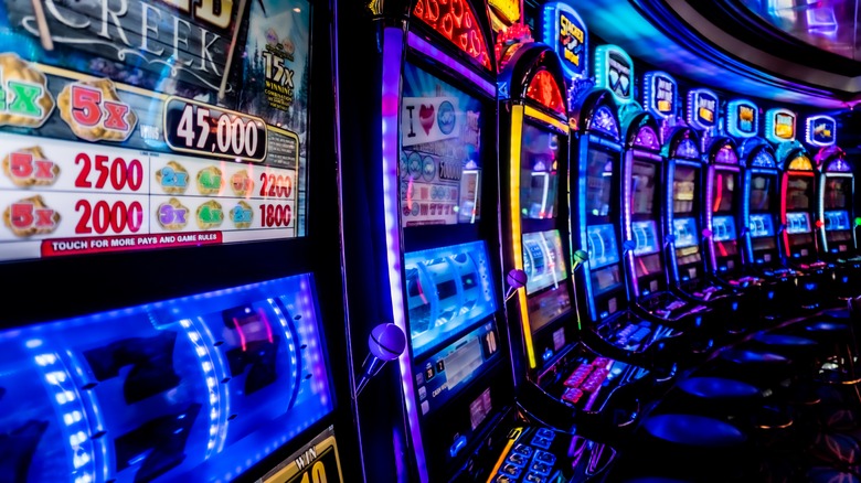 a row of casino gaming machines