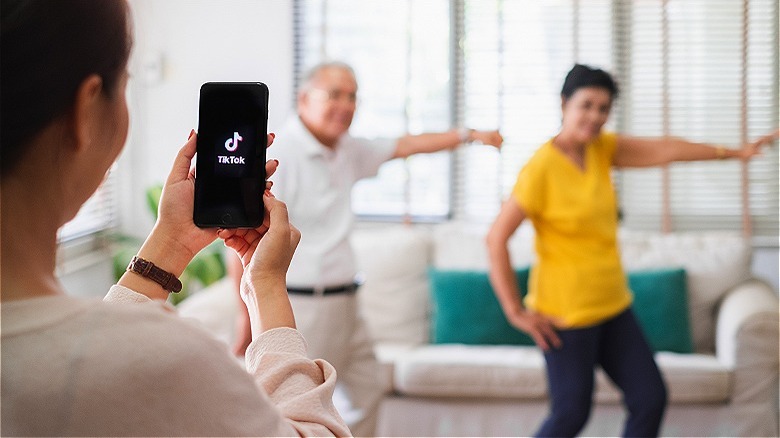 Person recording TikTok creators
