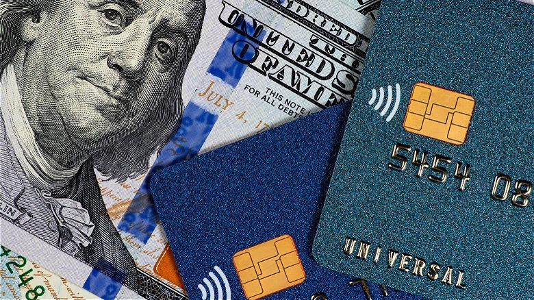 Two credit cards and $100