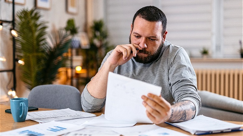 Person reviewing personal finance documents