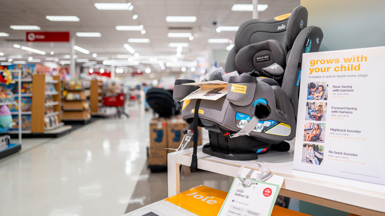 Baby accessories are displayed on shelves at a Target store