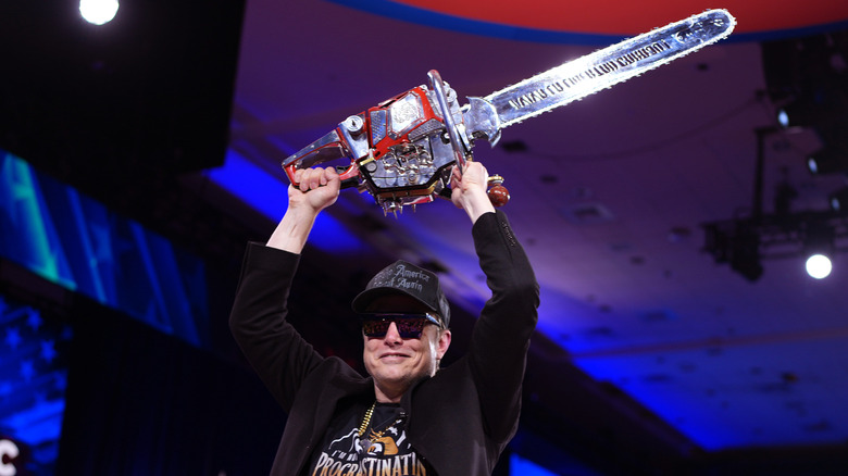 Elon Musk brandishes a chainsaw at CPAC.