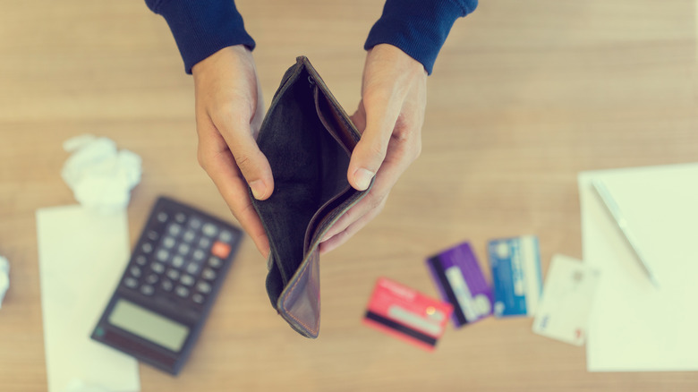Empty wallet over credit cards