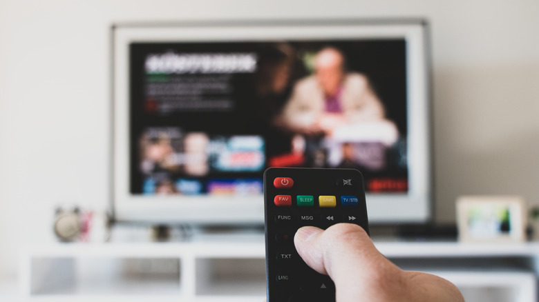 TV remote in front of streaming service