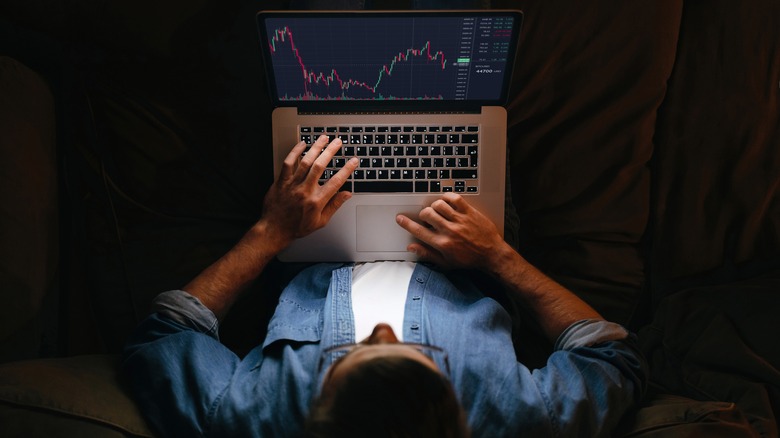 trader investigating price charts