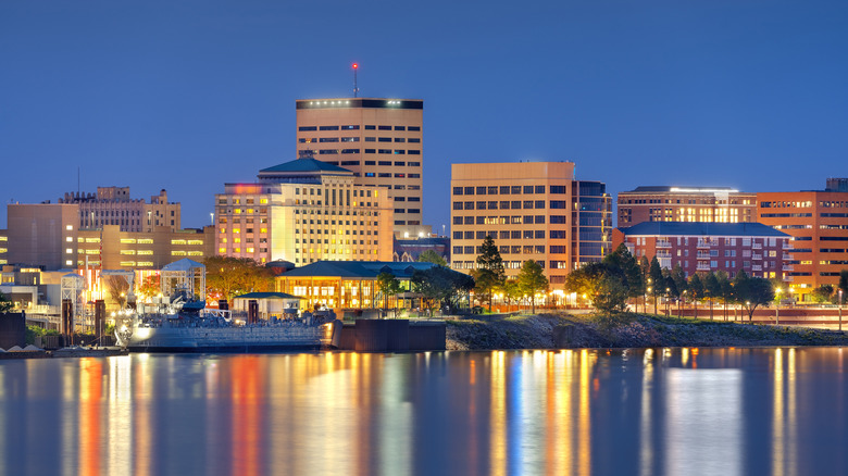 Evansville, Indiana, USA downtown skyline on the Ohio River at blue hour.