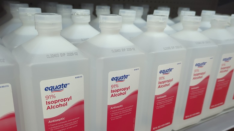 Isopropyl Rubbing Alcohol Bottles on store shelf at Walmart.