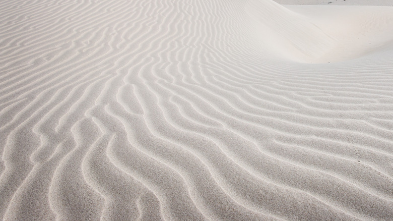 A close up of a pile of sand.