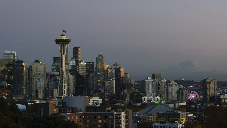 The Seattle skyline with a misty mountain in the background