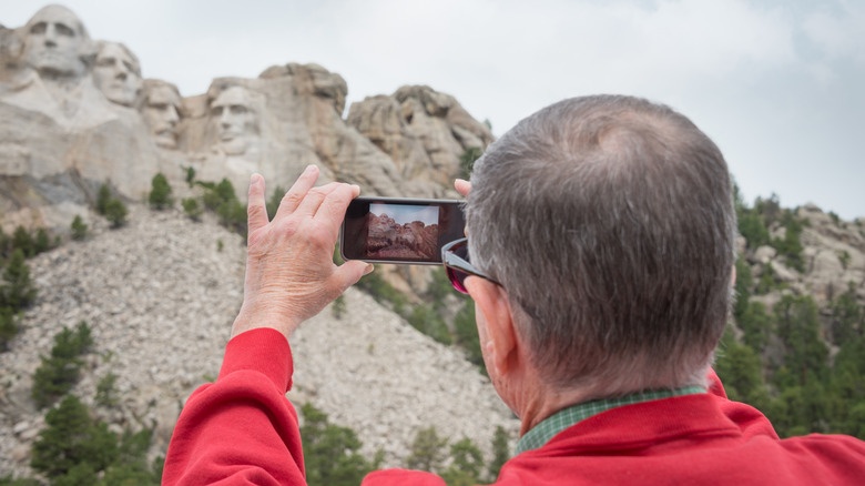 A senior taking a photo