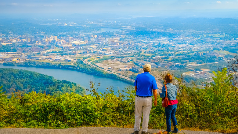 An elderly couple on a precipice