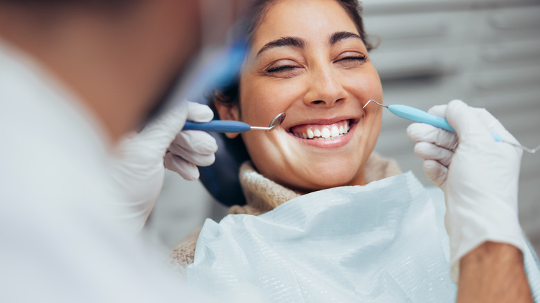 dentist working with patient