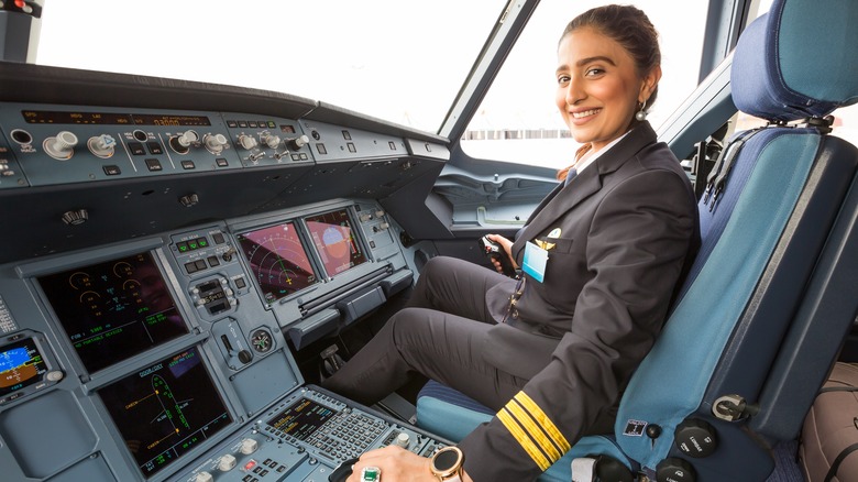 a pilot sitting in cockpit
