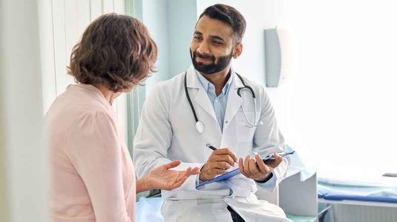 a physician with a patient